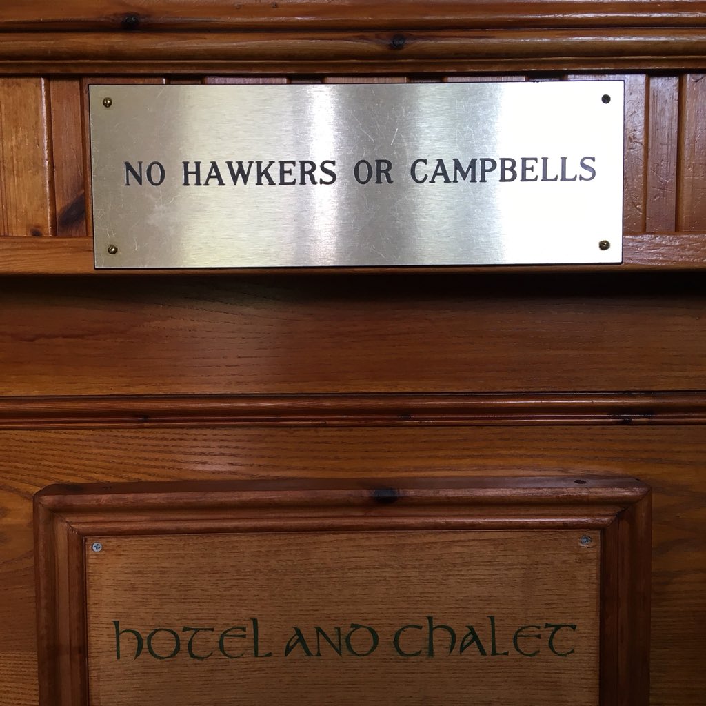 No Hawkers or Campbells’ sign displayed at Clachaig Inn in Glencoe, reflecting historic clan rivalry