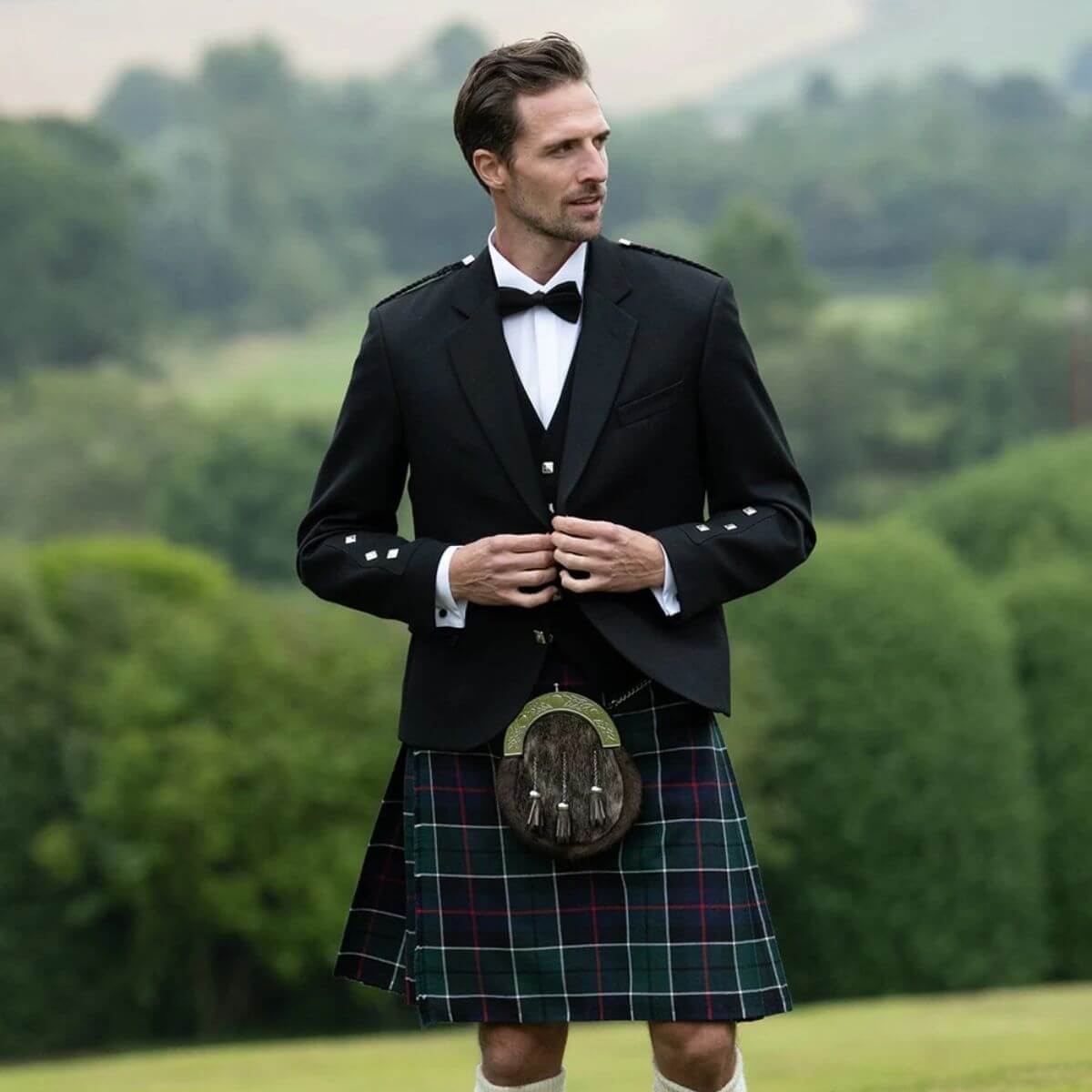 Argyll jacket with tartan kilt in traditional Highland dress
