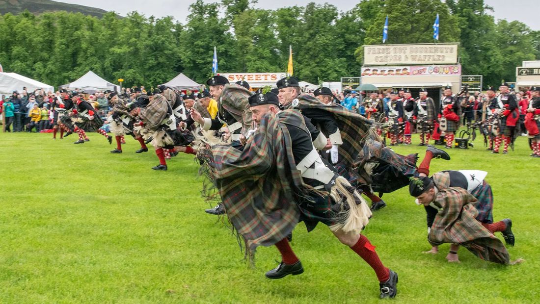 Atholl Gathering Highland Games kilted runners in Scotland