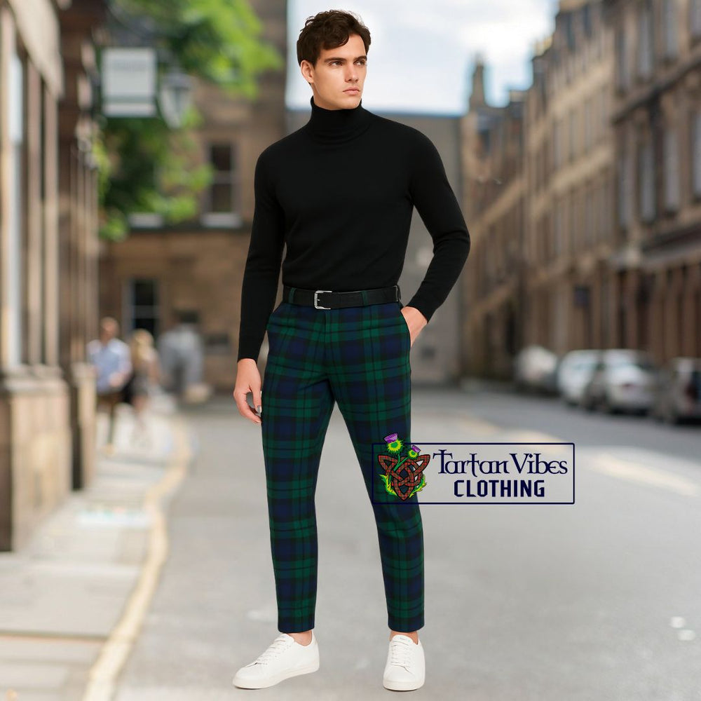 Black Turtleneck with Belted Tartan Pants 