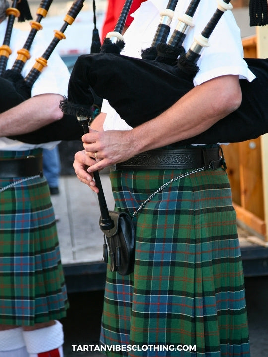Irish tartan kilt worn by a bagpiper during a traditional cultural performance