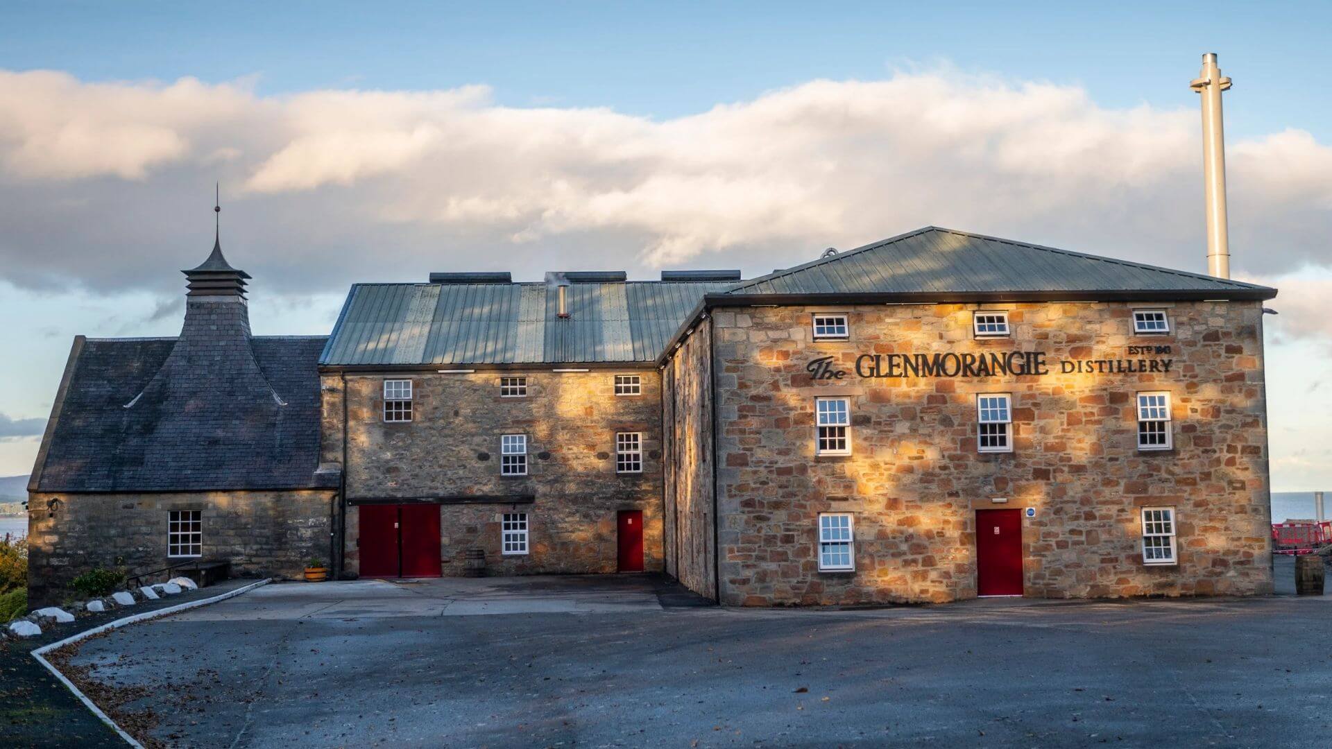 Glenmorangie Distillery in Scotland, historic stone buildings producing blended grain Scotch whisky