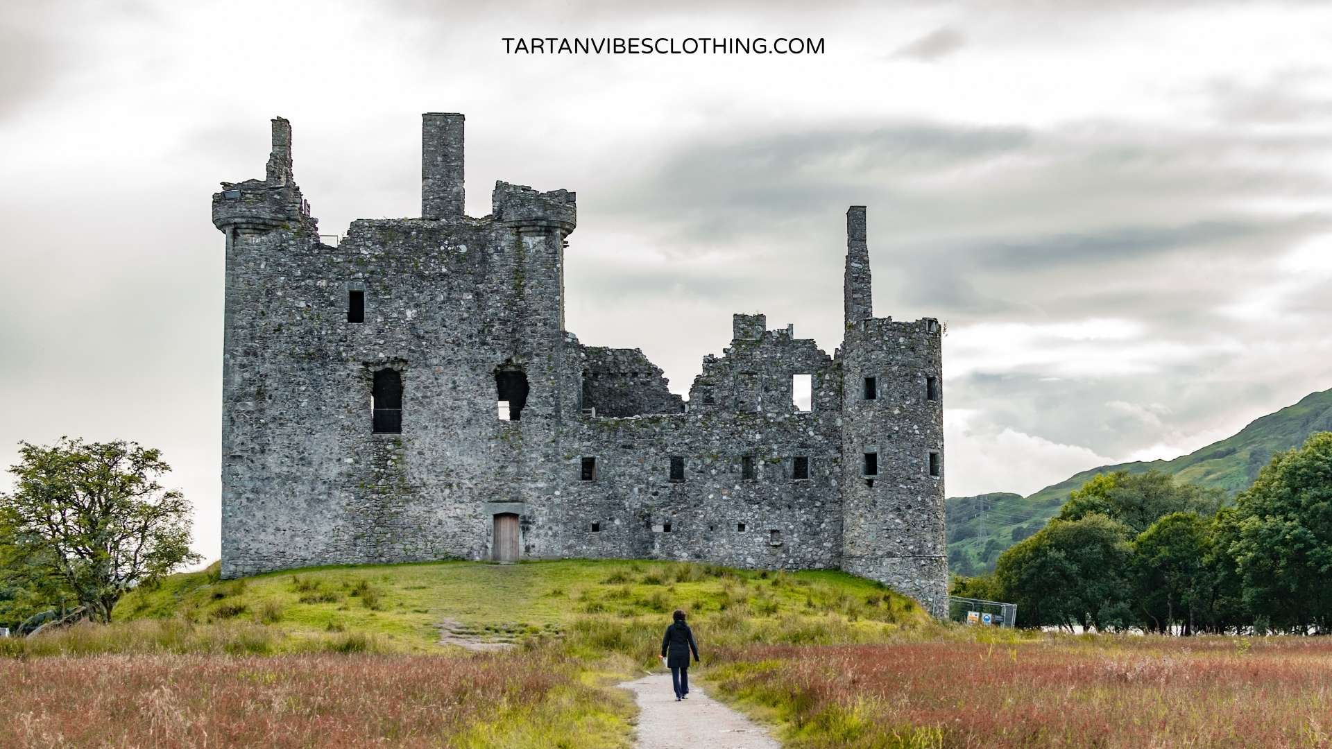 Kilchurn Castle ruins with visitor path showing restricted access in Scottish Highlands