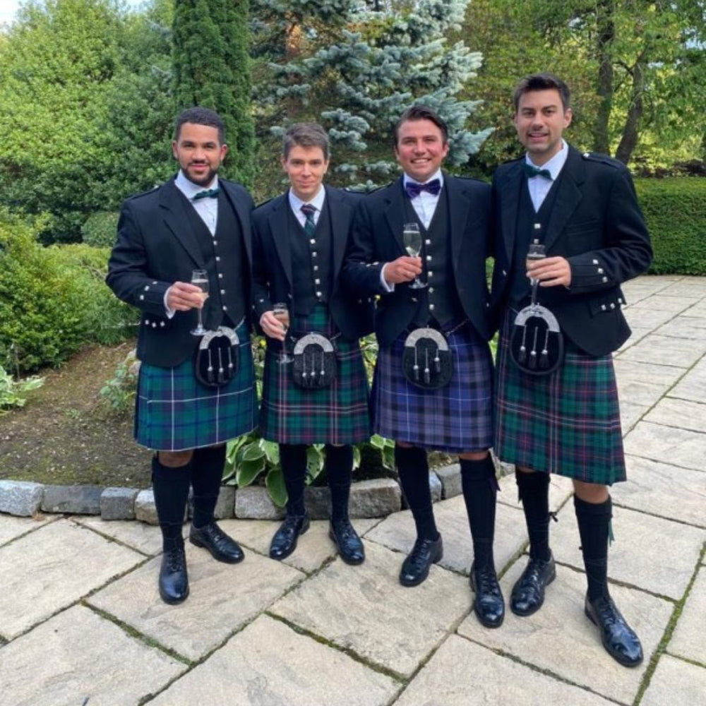 men wearing traditional Scottish kilts formal Highland dress with jackets and sporrans