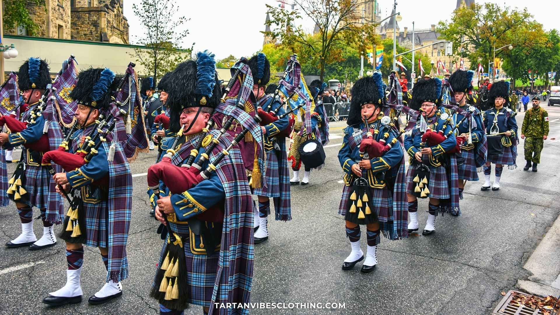 Marching band with bagpipers during a memorial parade heading towards Christ Cathedral, Ottawa, Canada