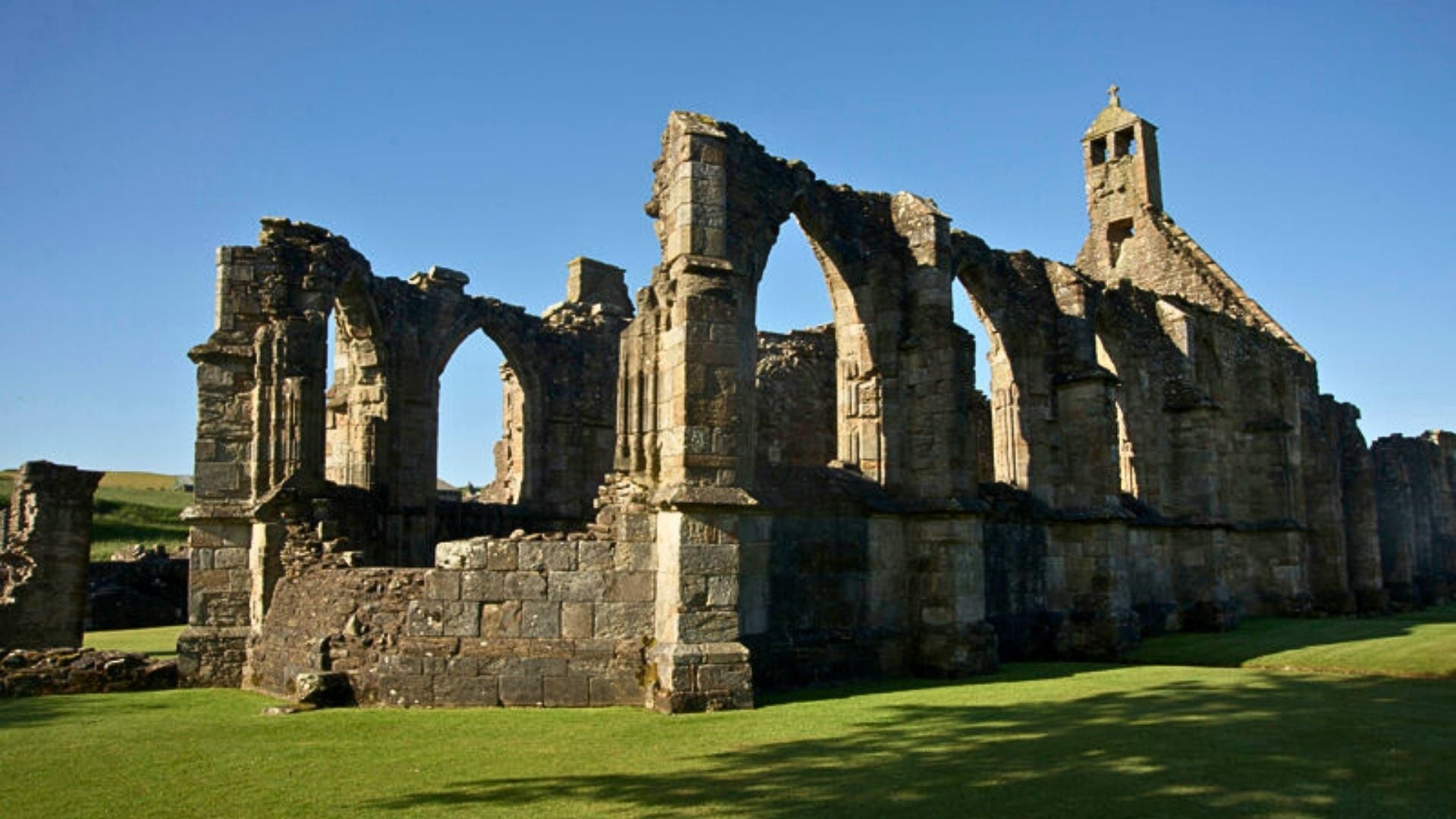 Ruins of Crossraguel Abbey, Ayrshire — site of the notorious 16th‑century conflict involving Gilbert Kennedy, 4th Earl of Cassillis.